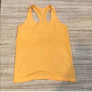 Orange lululemon racer back tank top